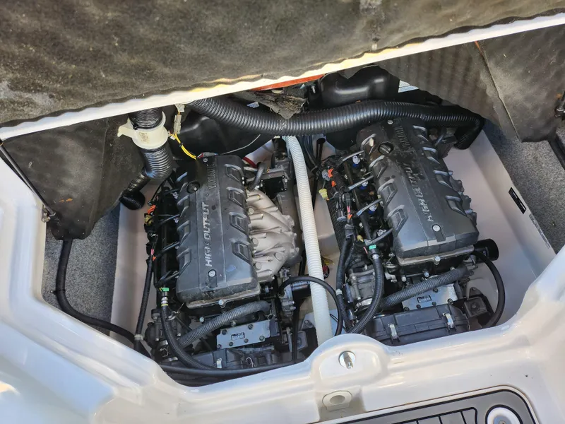 Slide: The Image of 2016 Yamaha Boats 242 Limited S engine compartment with dual engines. - 21