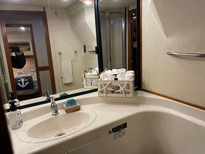 Slide: The Image of Bathroom interior of 1995 Bayliner 4788 Pilot House Motoryacht with sink and toiletries. - 32