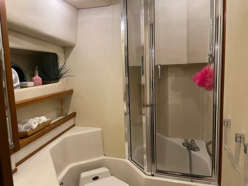 Slide: The Image of Luxurious bathroom in 1995 Bayliner 4788 Pilot House Motoryacht with shower and elegant decor. - 45