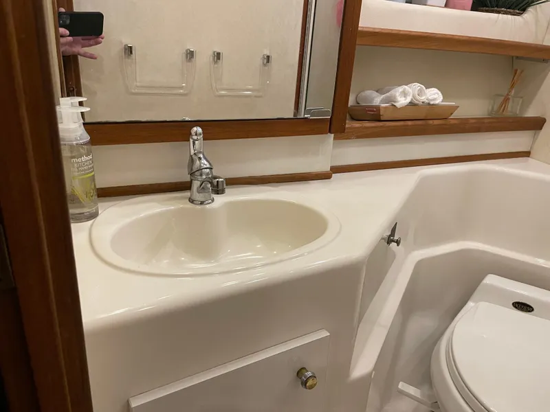 Slide: The Image of Bathroom interior of 1995 Bayliner 4788 Pilot House Motoryacht with sink and toilet. - 46
