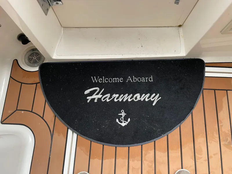 Slide: The Image of Welcome mat on 1995 Bayliner 4788 Pilot House Motoryacht, "Harmony," with anchor design. - 5