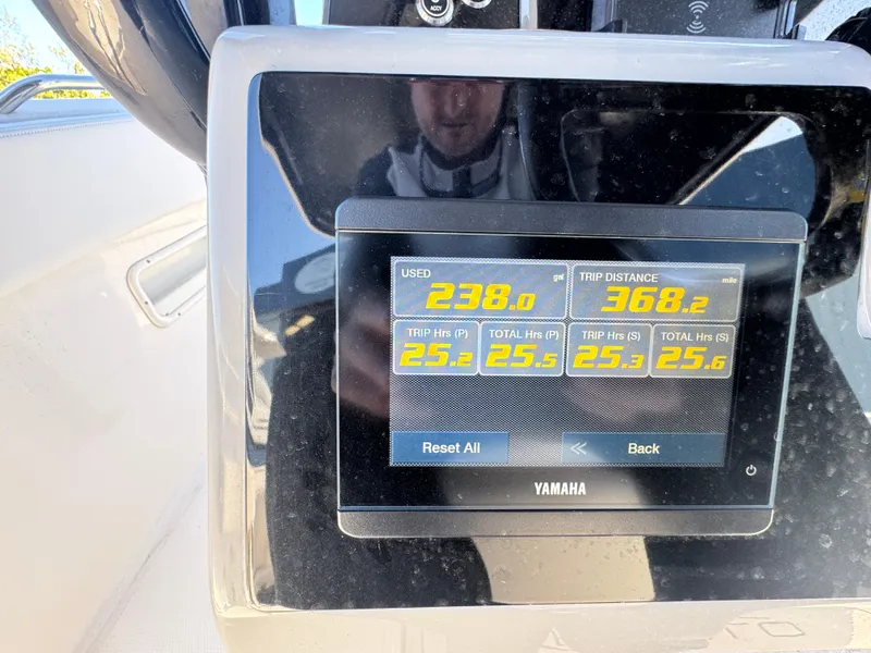 Slide: The Image of Yamaha display on 2023 Robalo R270 Center Console showing trip data and fuel usage. - 28