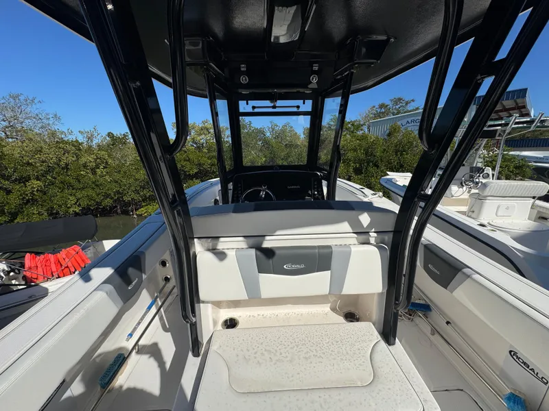 Slide: The Image of 2023 Robalo R270 Center Console boat interior with seating and console view. - 43
