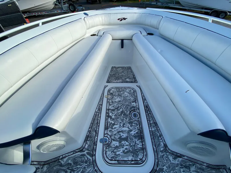 Slide: The Image of 2020 Glasstream 280 Pro-XS boat interior with white seating and patterned flooring. - 25