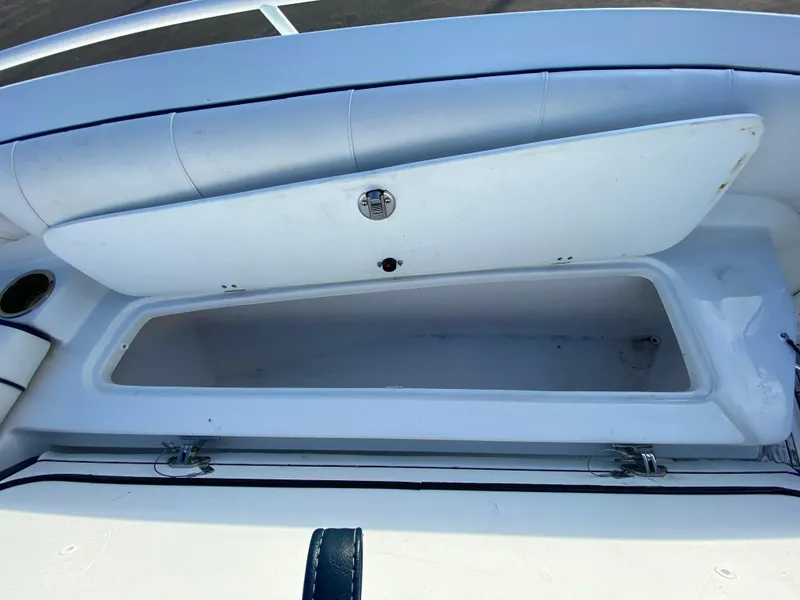 Slide: The Image of Open storage compartment on 2020 Glasstream 280 Pro-XS boat. - 31