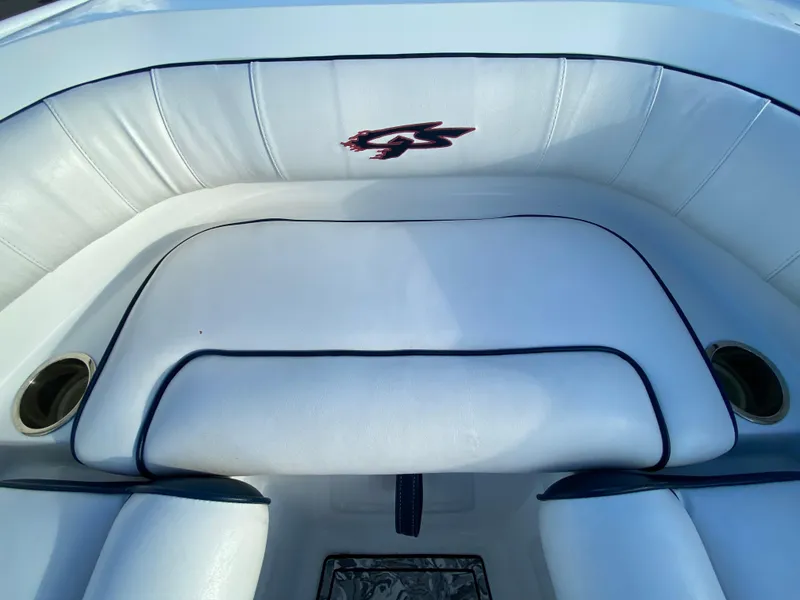 Slide: The Image of 2020 Glasstream 280 Pro-XS boat interior with white cushioned seating and logo. - 32