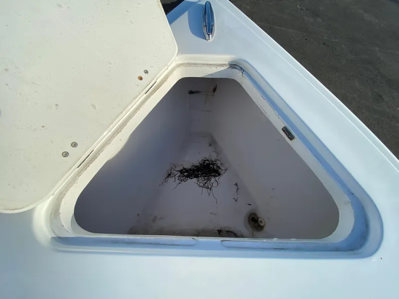 Slide: The Image of Open storage compartment on 2020 Glasstream 280 Pro-XS boat. - 34