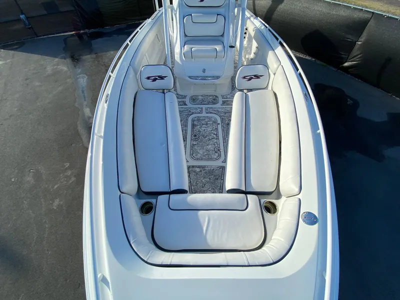 Slide: The Image of 2020 Glasstream 280 Pro-XS boat interior with white cushioned seating. - 35