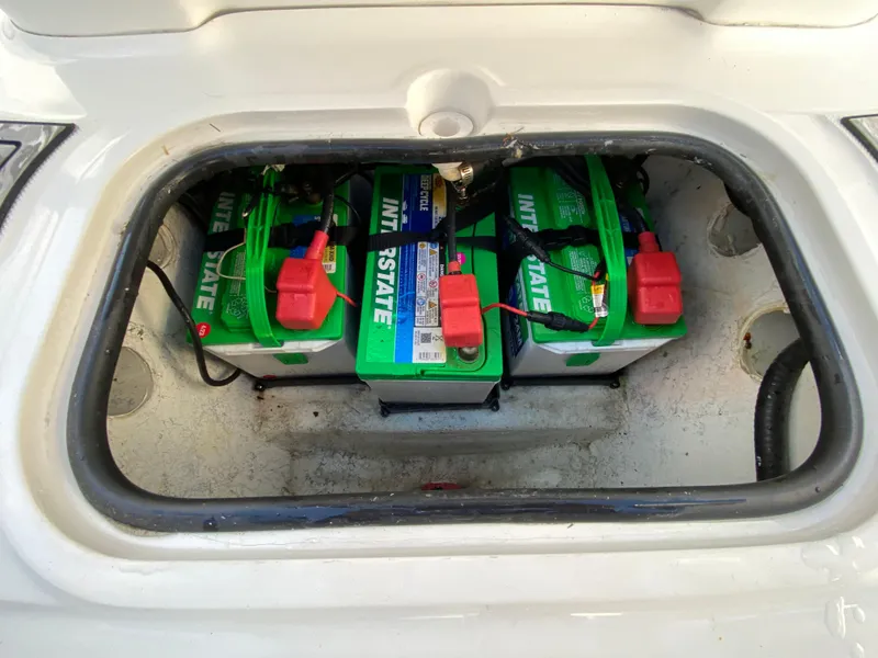 Slide: The Image of 2020 Glasstream 280 Pro-XS boat battery compartment with Interstate batteries. - 38