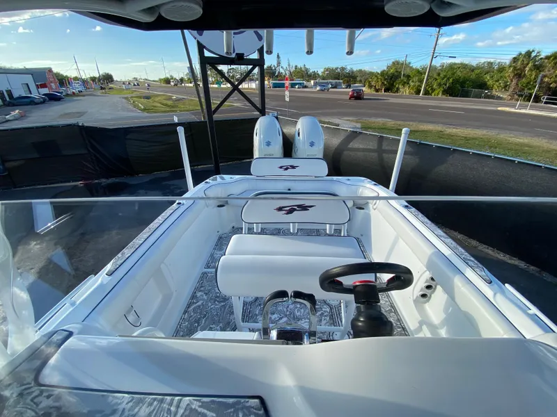 Slide: The Image of 2020 Glasstream 280 Pro-XS boat interior with dual seats and steering wheel. - 43