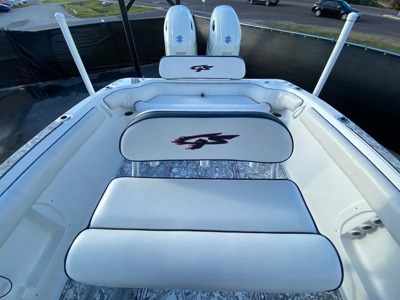 Slide: The Image of 2020 Glasstream 280 Pro-XS boat interior with white seating and logo. - 44