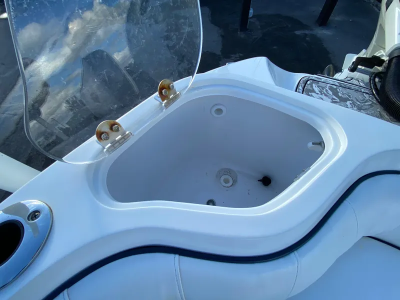 Slide: The Image of 2020 Glasstream 280 Pro-XS boat compartment with open lid, showcasing interior details. - 48