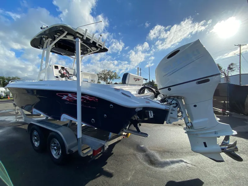 Slide: The Image of 2020 Glasstream 280 Pro-XS boat on trailer under blue sky. - 7