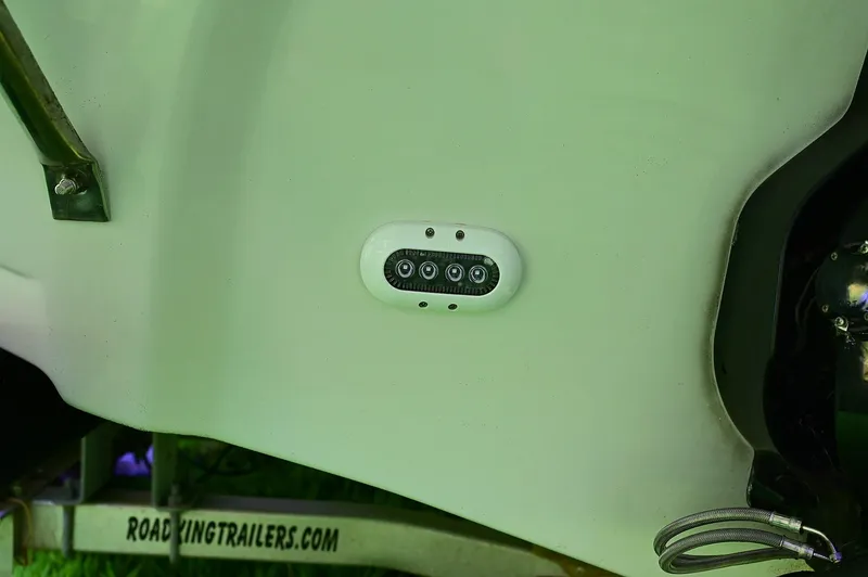 Slide: The Image of 2015 Crownline 236 boat with underwater LED lights on trailer. - 19