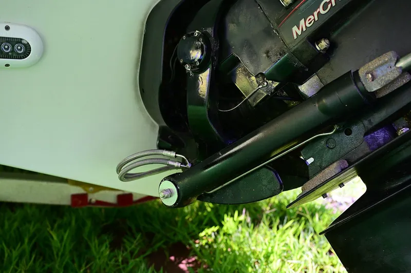 Slide: The Image of Close-up of a 2015 Crownline 236 boat's MerCruiser engine component. - 29