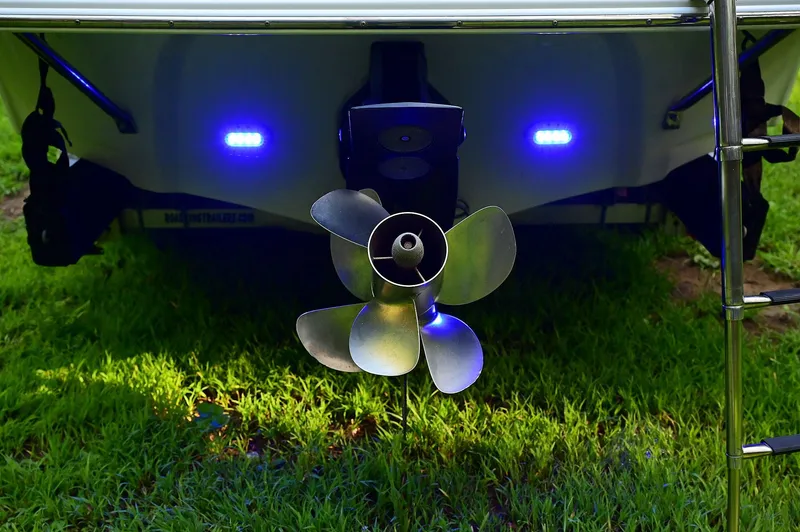 Slide: The Image of Crownline 236 boat propeller with blue underwater lights, 2015 model. - 31