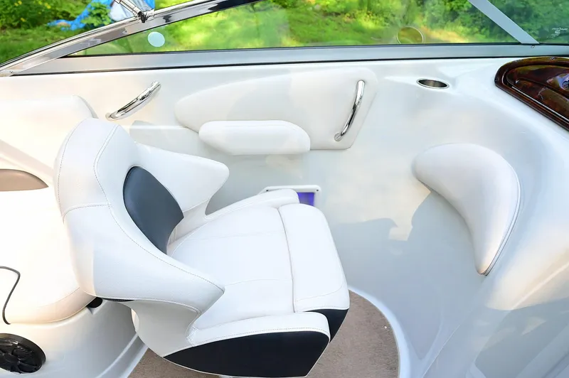Slide: The Image of Interior of 2015 Crownline 236 boat with white and black seating. - 45
