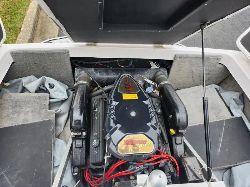 Slide: The Image of 2004 Supra Launch SSV engine compartment with V8 engine and wiring visible. - 19