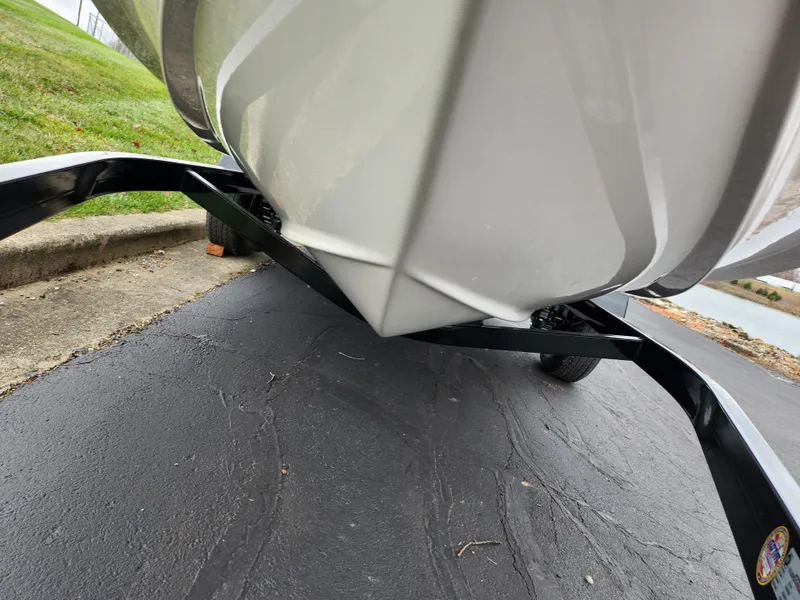 Slide: The Image of 2004 Chaparral 180 SSi boat on trailer, close-up of hull and trailer frame. - 7