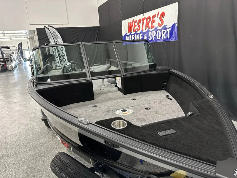 Slide: The Image of 2025 Alumacraft Competitor 205X Sport boat displayed at Westre's Marine & Sport showroom. - 3