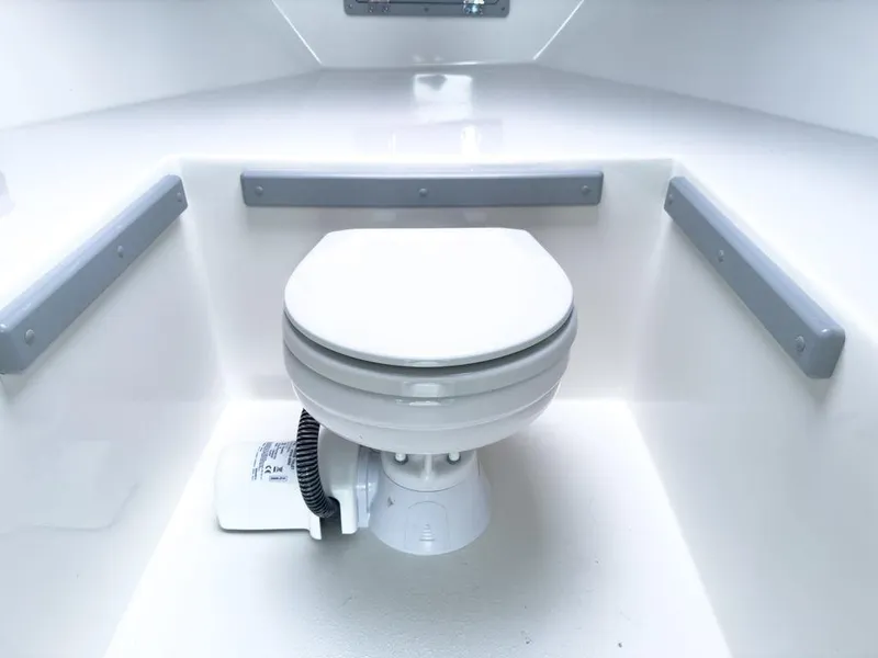 Slide: The Image of 2025 Defiance 260 Admiral boat interior with marine toilet. - 13