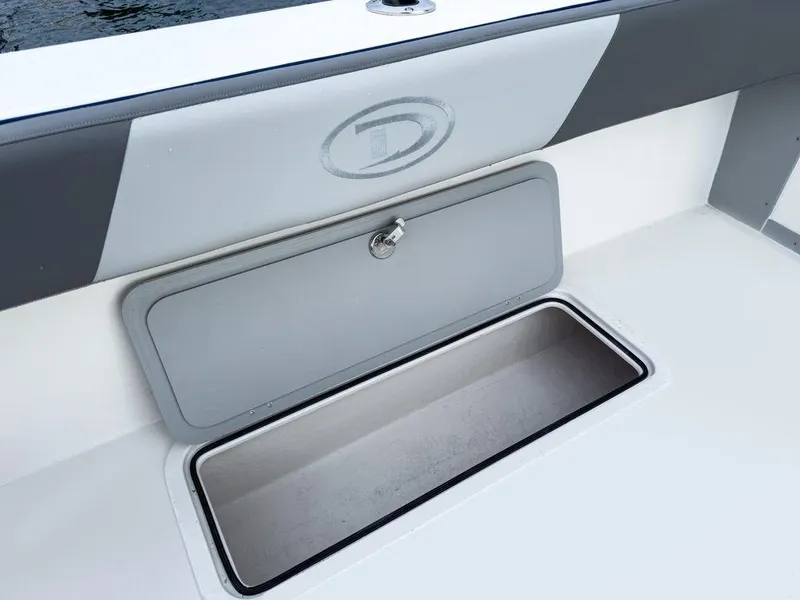 Slide: The Image of 2025 Defiance 260 Admiral boat storage compartment with open hatch. - 7
