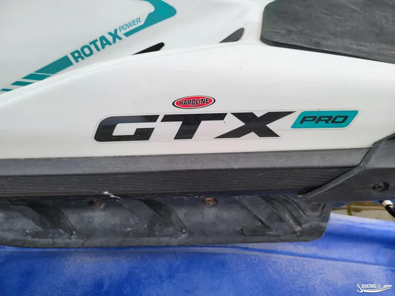 Slide: The Image of 2022 Sea-Doo GTX PRO 130 with Rotax Power branding on the side. - 6