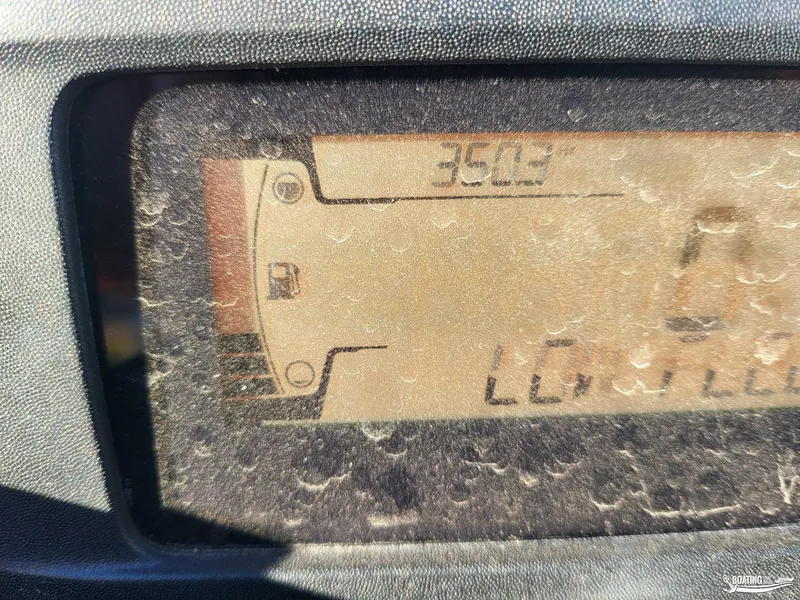 Slide: The Image of Close-up of a dusty Sea-Doo GTX PRO 130 dashboard display, showing 350.3 hours. - 9