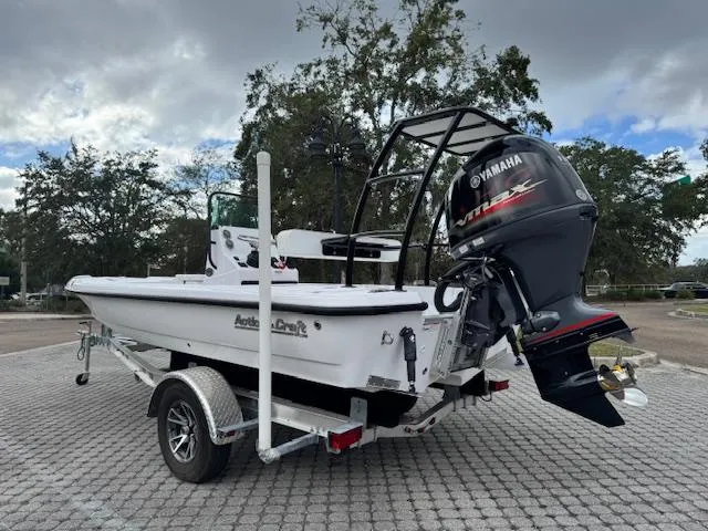 Slide: The Image of 2025 Action Craft 17 Flats boat with Yamaha outboard on trailer. - 9