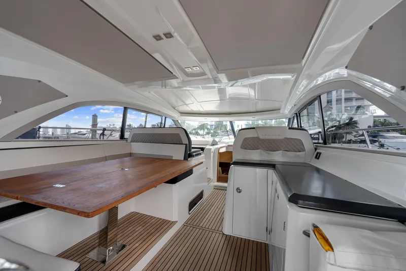 Slide: The Image of Interior of 2018 Jeanneau Leader 46 yacht with sleek design and spacious seating area. - 10