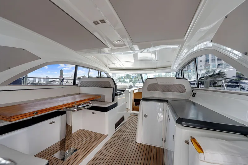 Slide: The Image of Interior of 2018 Jeanneau Leader 46 yacht with sleek design and spacious seating. - 11