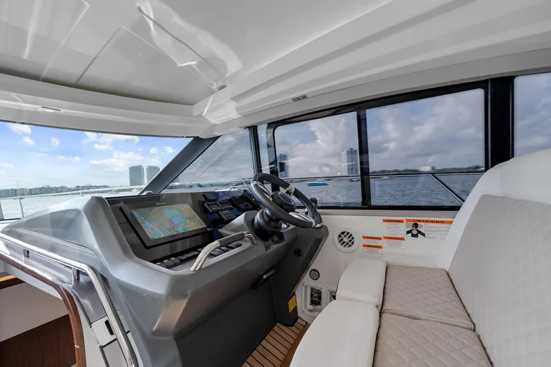 Slide: The Image of Interior view of 2018 Jeanneau Leader 46 yacht cockpit with navigation system. - 30