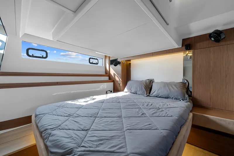 Slide: The Image of Luxurious cabin interior of 2018 Jeanneau Leader 46 yacht with cozy bedding. - 37