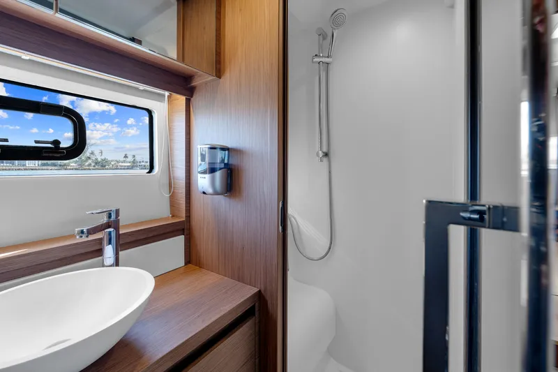 Slide: The Image of Modern bathroom interior on 2018 Jeanneau Leader 46 yacht, featuring sleek design and fixtures. - 38