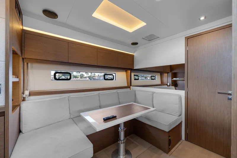 Slide: The Image of Interior of 2018 Jeanneau Leader 46 yacht with modern seating and table. - 40