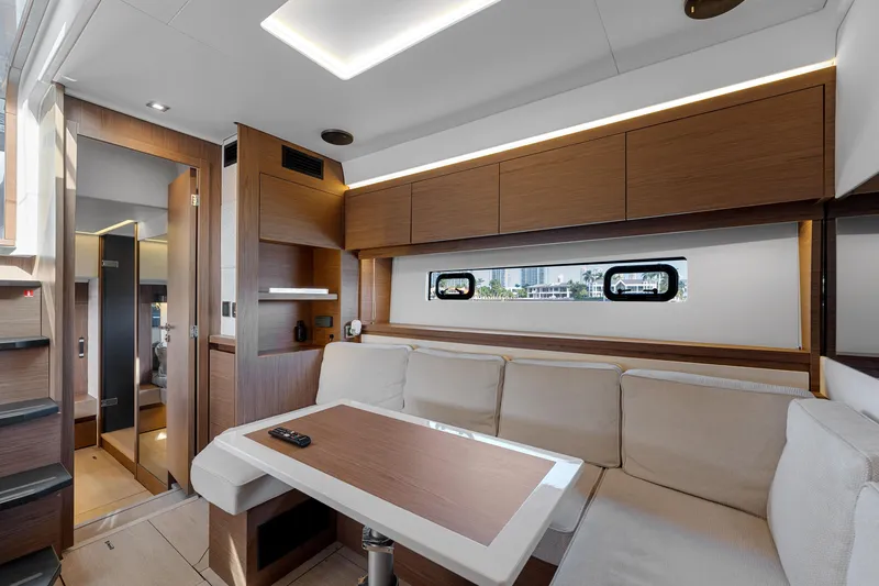 Slide: The Image of Luxurious interior of 2018 Jeanneau Leader 46 yacht with modern seating and wooden accents. - 41