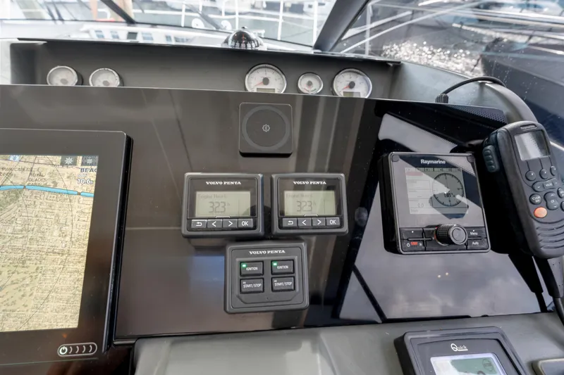 Slide: The Image of Control panel of 2018 Jeanneau Leader 46 yacht with navigation and communication devices. - 49