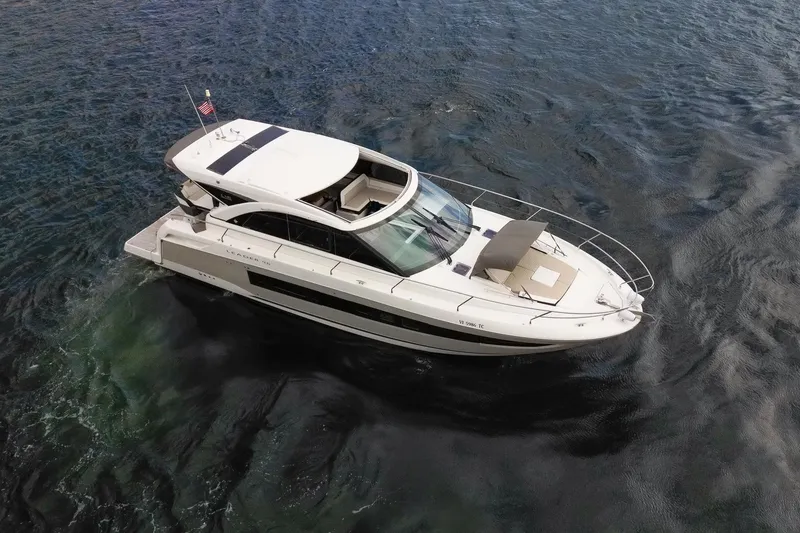 Slide: The Image of 2018 Jeanneau Leader 46 yacht cruising on open water. - 6