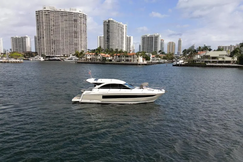 Slide: The Image of 2018 Jeanneau Leader 46 yacht cruising in urban waterfront setting. - 7