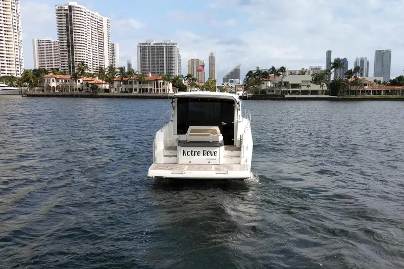 Slide: The Image of 2018 Jeanneau Leader 46 yacht cruising in urban waterfront setting. - 8