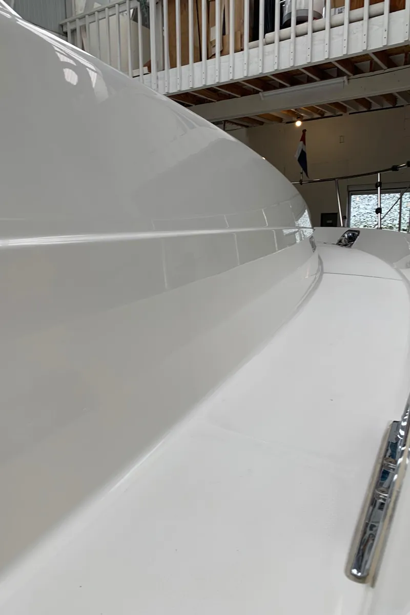 Slide: The Image of 1997 Bayliner Pilothouse helm with navigation equipment and steering wheel. - 16