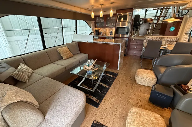Slide: The Image of Luxurious interior of a 1997 Bayliner 5788 Pilot House Motoryacht with modern furnishings. - 38