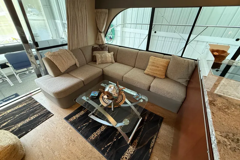 Slide: The Image of Luxurious 1997 Bayliner 5788 Pilot House Motoryacht interior with modern kitchen and seating area. - 42