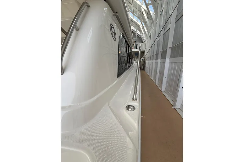 Slide: The Image of Luxurious bedroom interior of 1997 Bayliner 5788 Pilot House Motoryacht with cozy bedding. - 51