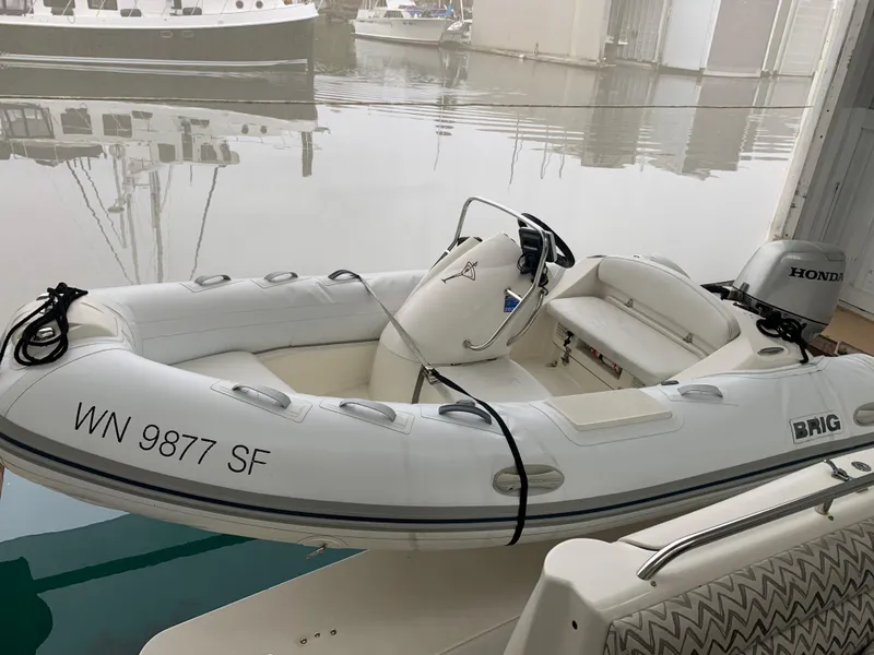 Slide: The Image of Dashboard gauges of a 1997 Bayliner Pilothouse boat, featuring RPM and engine hours. - 6