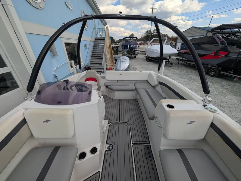 Slide: The Image of 2020 Starcraft SVX 171 boat interior with seating and steering console. - 14