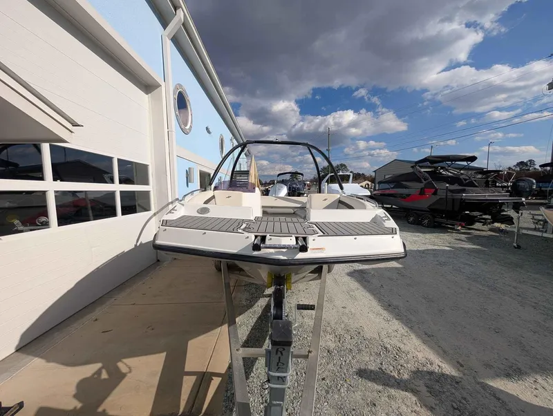 Slide: The Image of 2020 Starcraft SVX 171 boat displayed outdoors under a cloudy sky. - 3