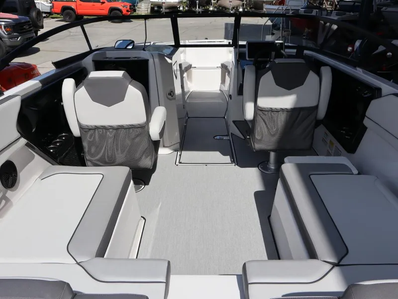 Slide: The Image of 2025 Yamaha Boats AR250 interior with modern seating and sleek design. - 19
