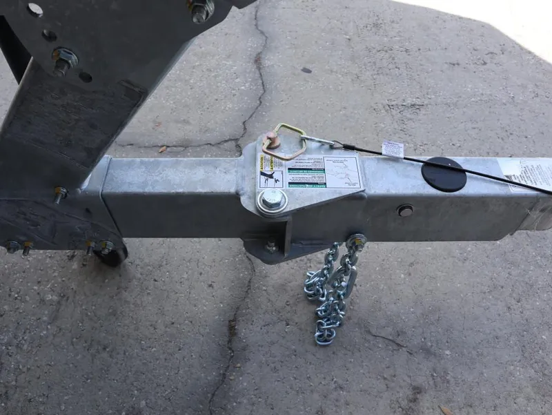 Slide: The Image of Trailer hitch of 2025 Yamaha Boats AR250 on concrete surface. - 23