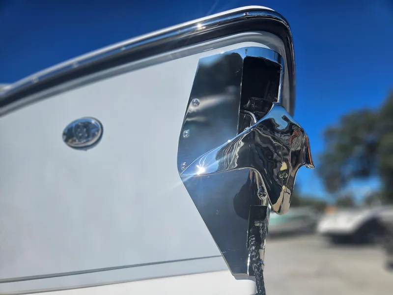 Slide: The Image of Close-up of 2025 Monterey Elite 30 OB boat's sleek chrome detailing. - 11